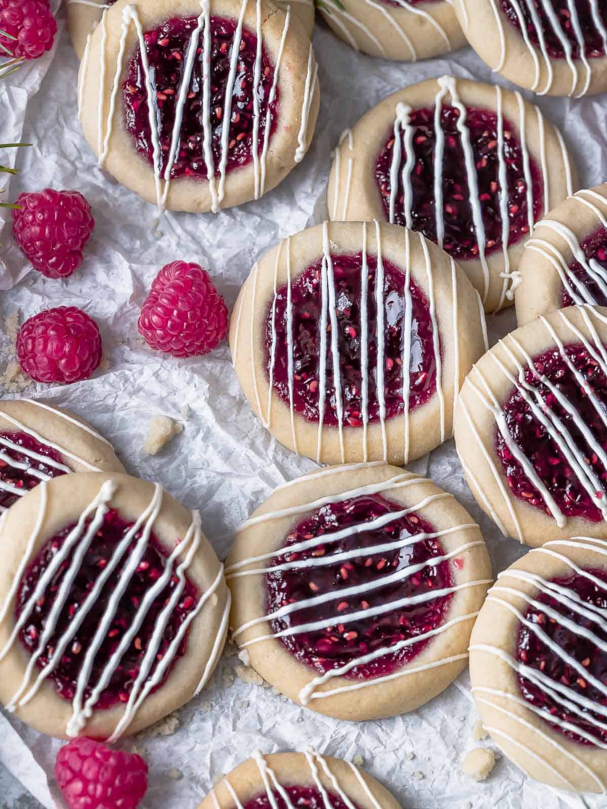 raspberry jam cookies drizzled with icing