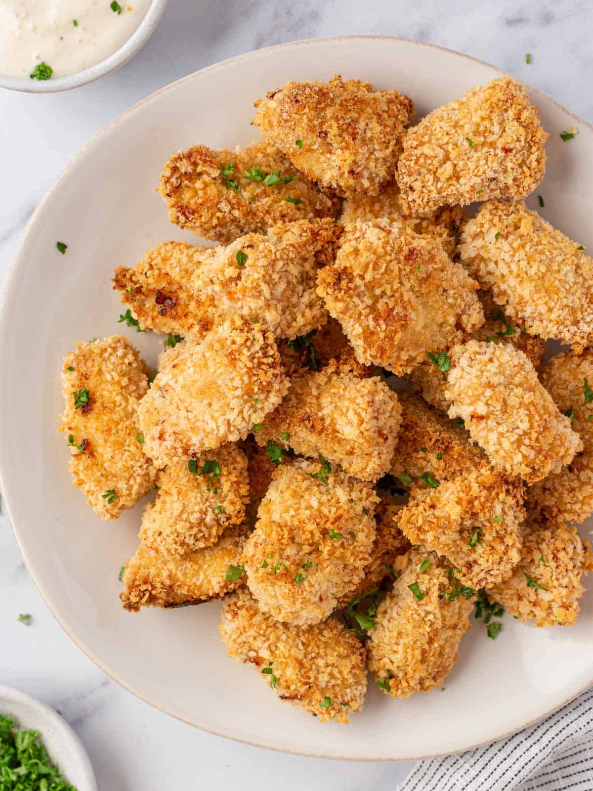 A plate of popcorn chicken.