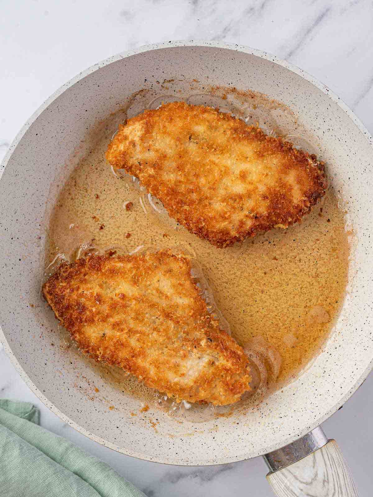 Pan fried chicken breasts.
