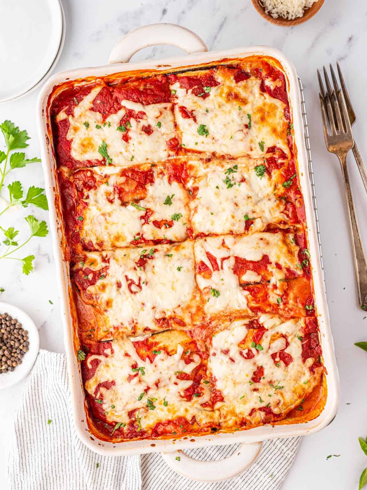 top down shot of eggplant lasagna in a baking dish