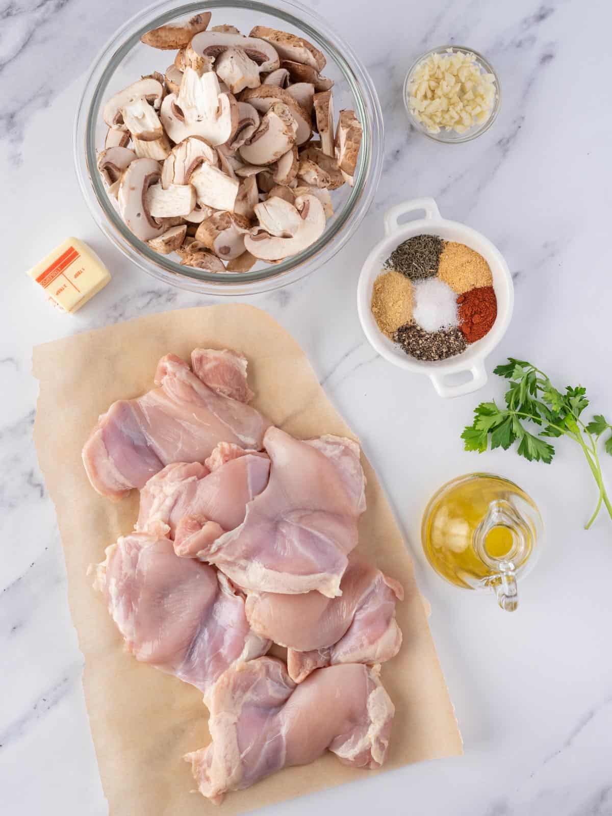 Ingredients to make garlic mushroom chicken thighs.