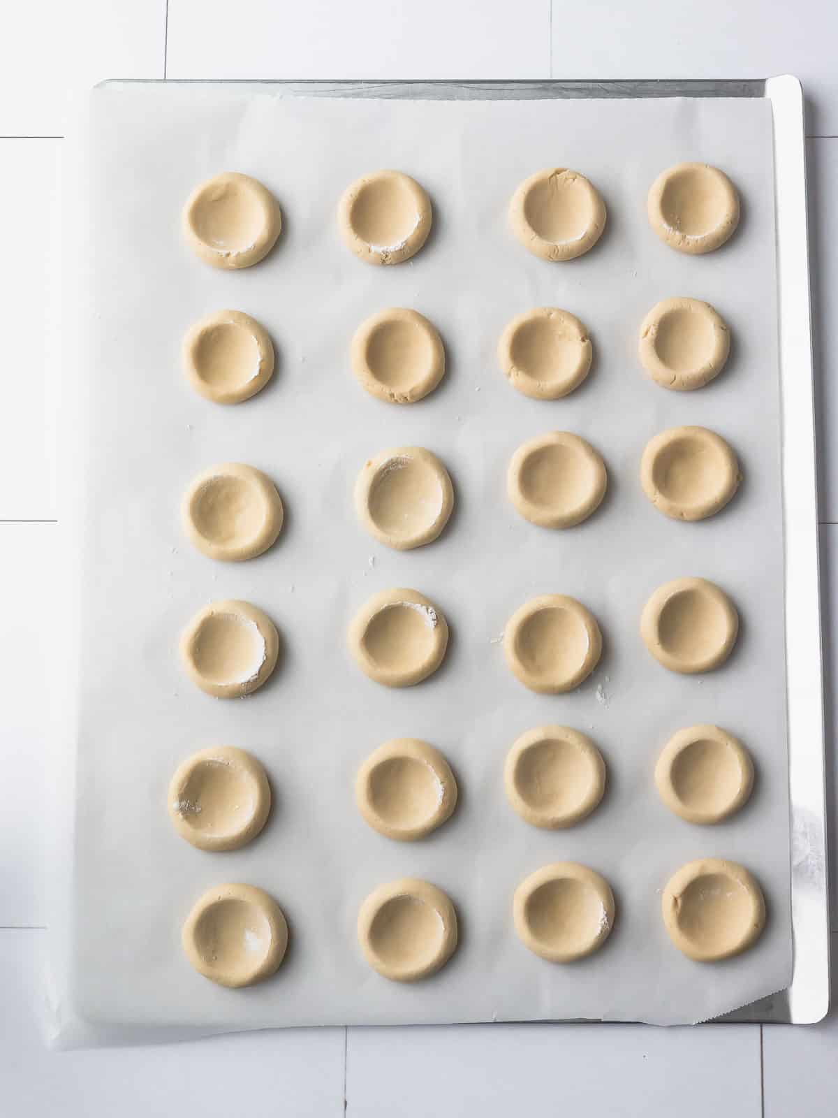 raspberry jam cookies after thumbprinting