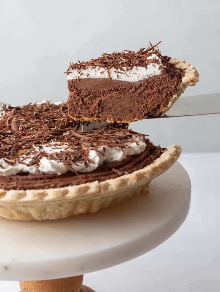 pie piece being lifted up with a spatula