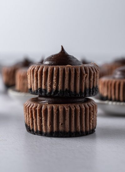 two chocolate mini cheesecake staked