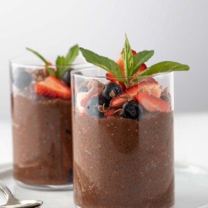 2 chia chocolate pudding topped with fruits