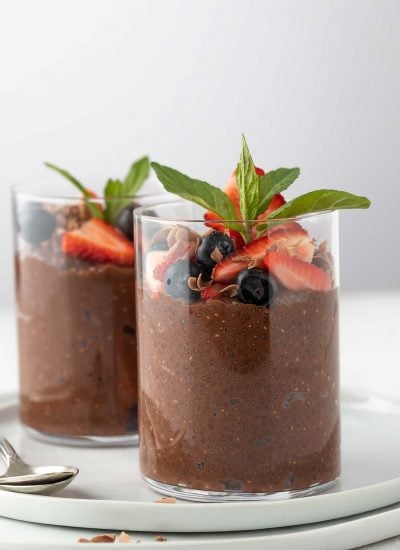 2 chia chocolate pudding topped with fruits