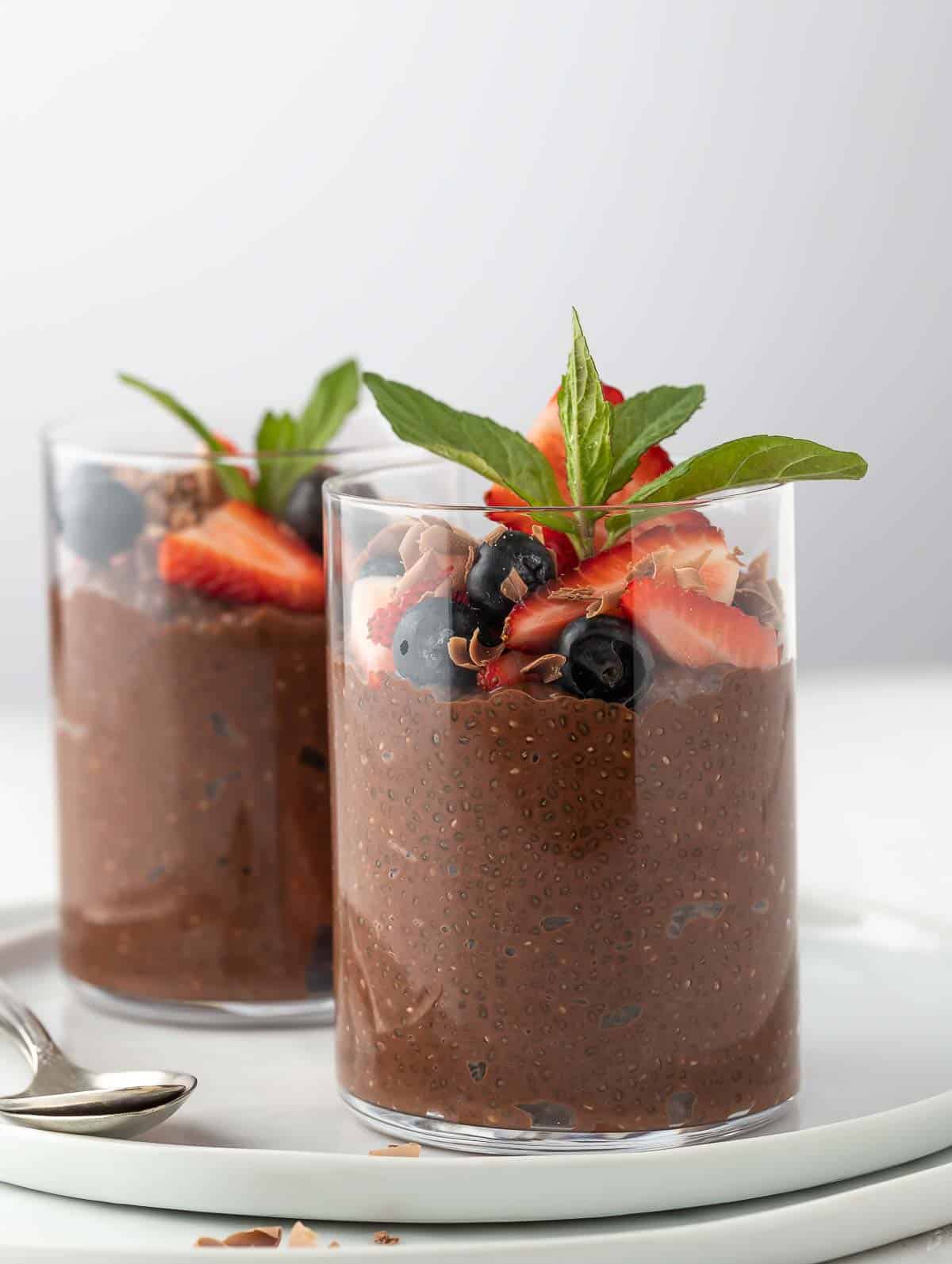 2 chia chocolate pudding topped with fruits
