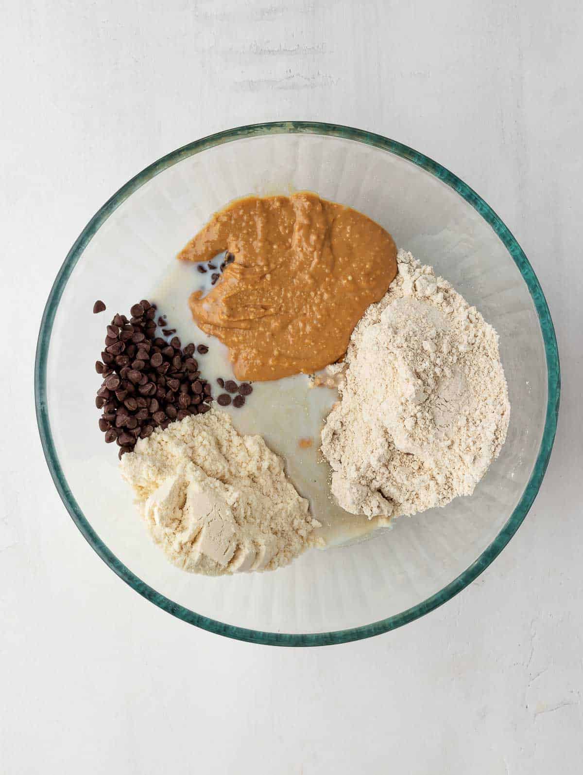 protein cookie dough ingredients in a bowl before mixing