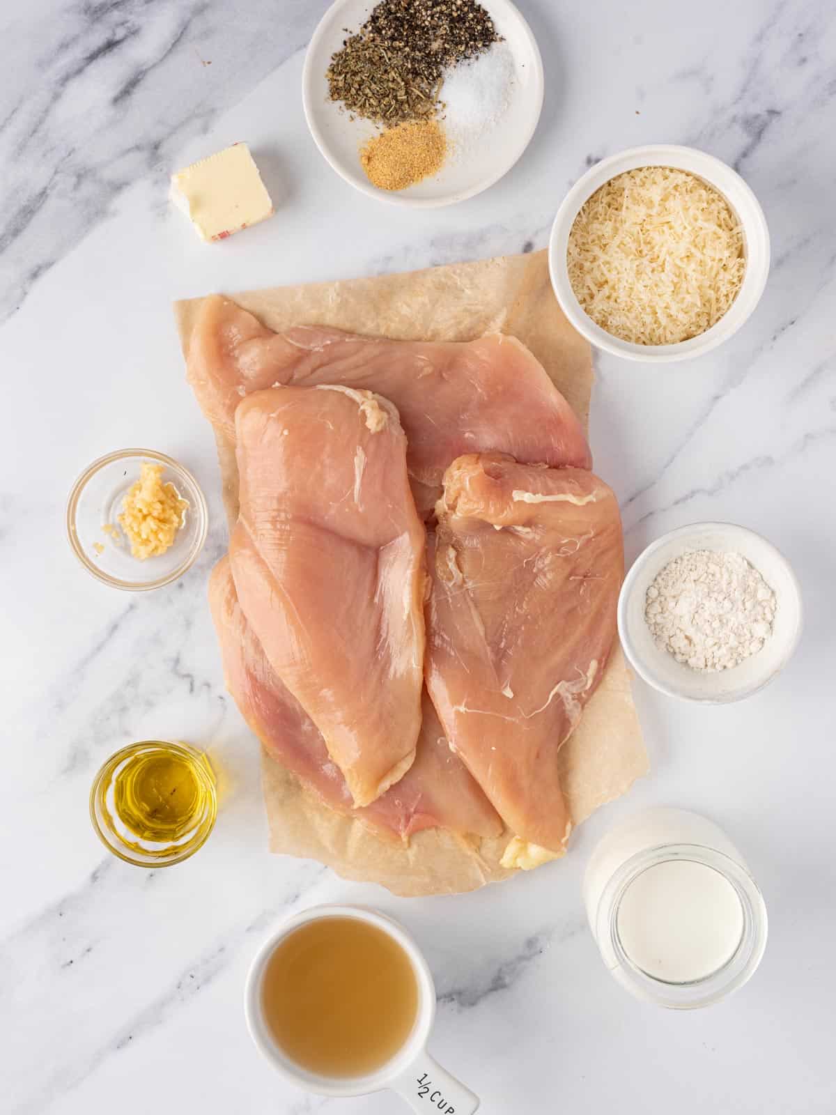 Ingredients needed for creamy garlic parmesan chicken.