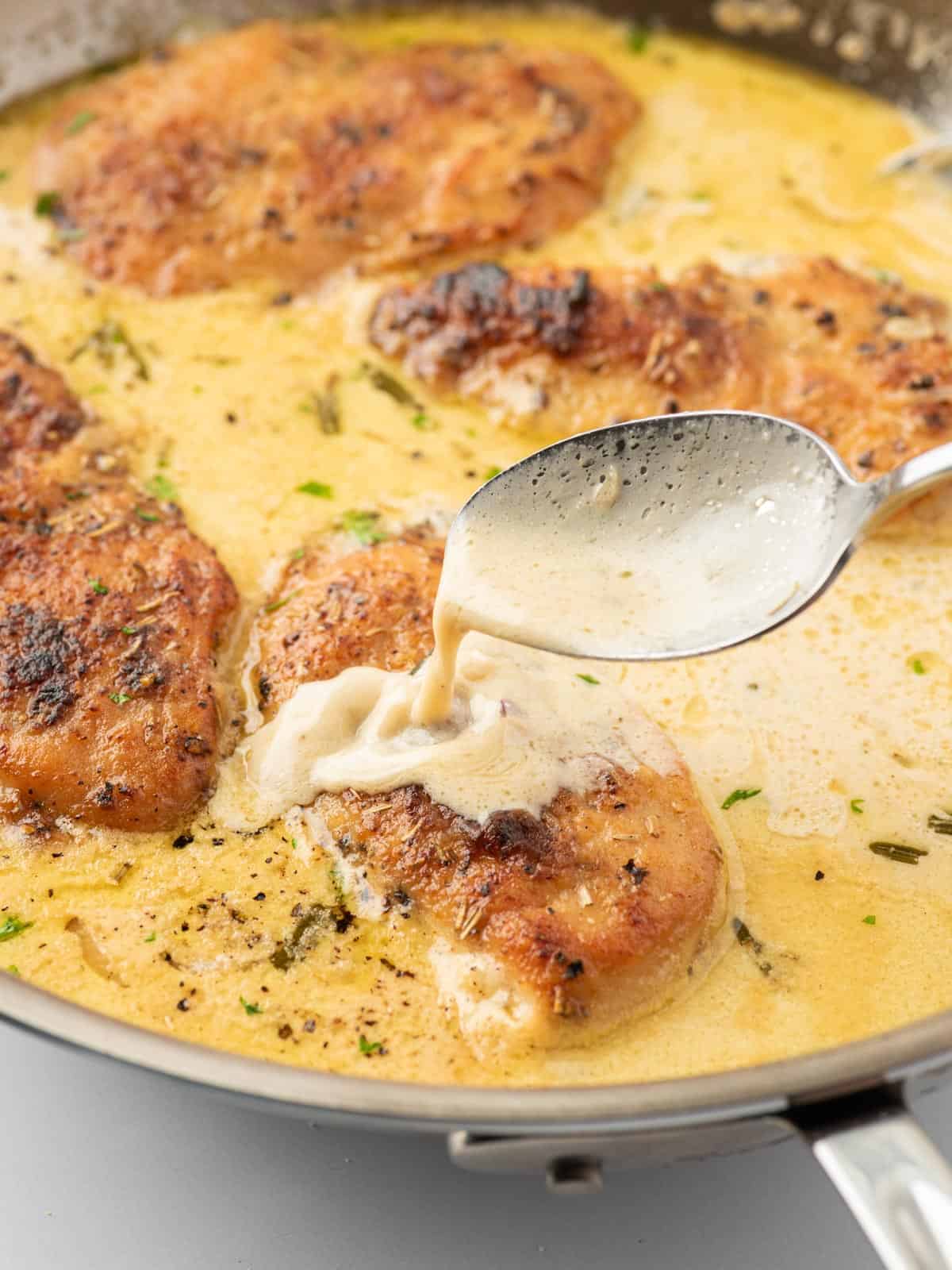 Mustard sauce spooned over chicken.