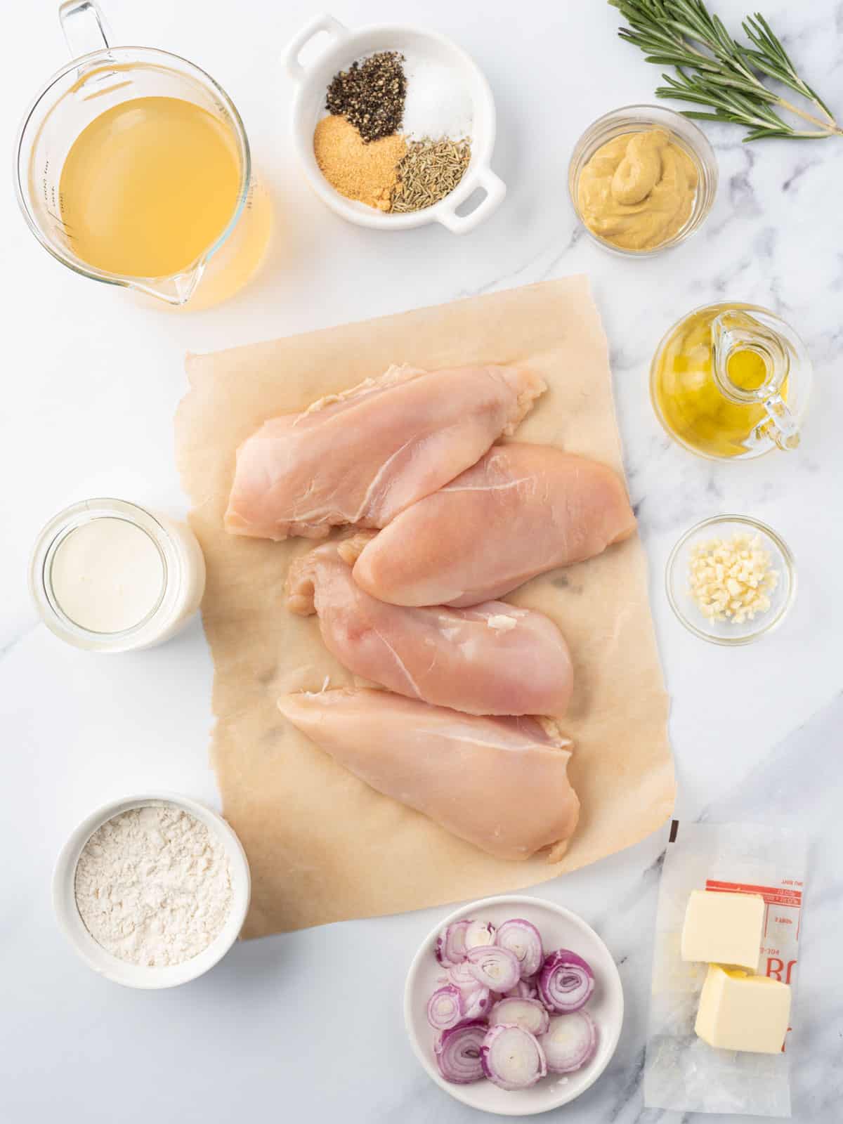 Ingredients needed to make creamy mustard chicken.