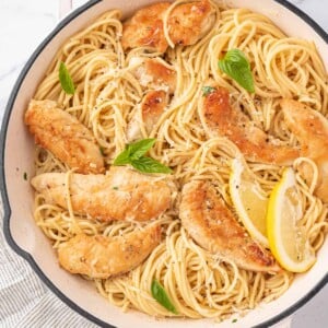 Chicken scampi pasta in a skillet.