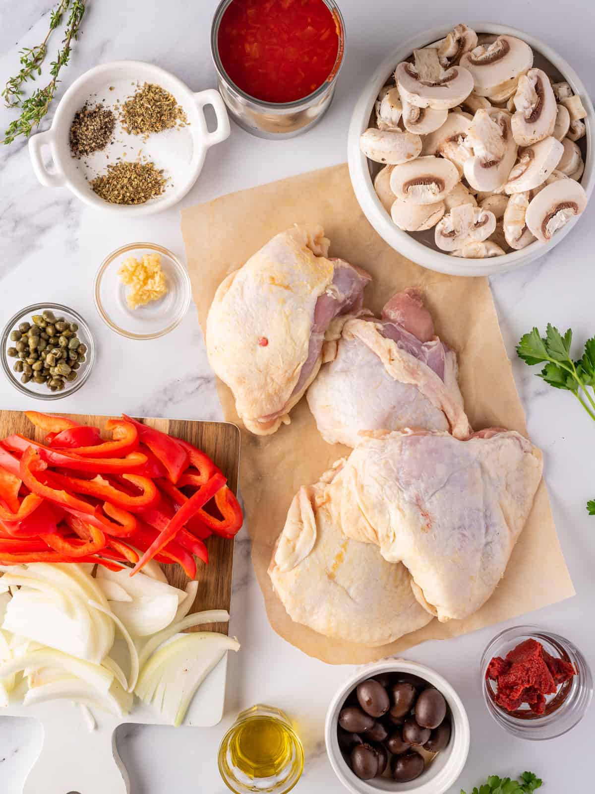 Ingredients needed for making easy chicken cacciatore.