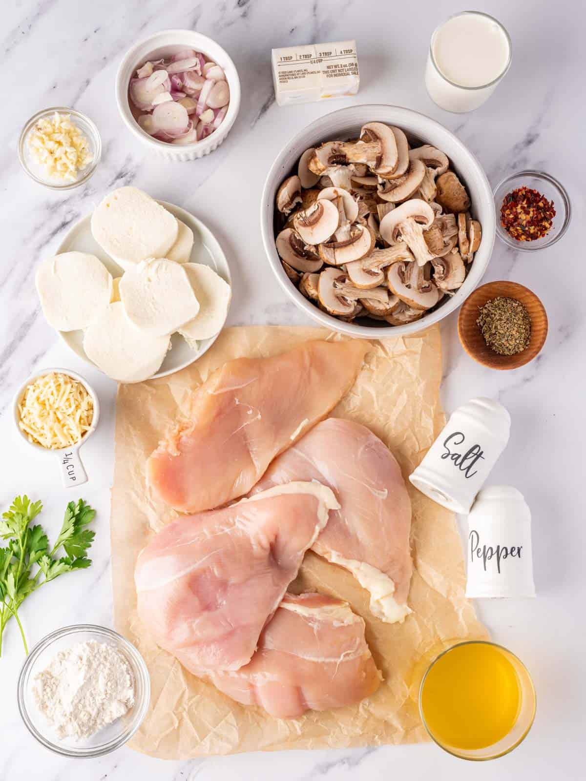 Ingredients needed to make stuffed chicken breast with mushrooms.