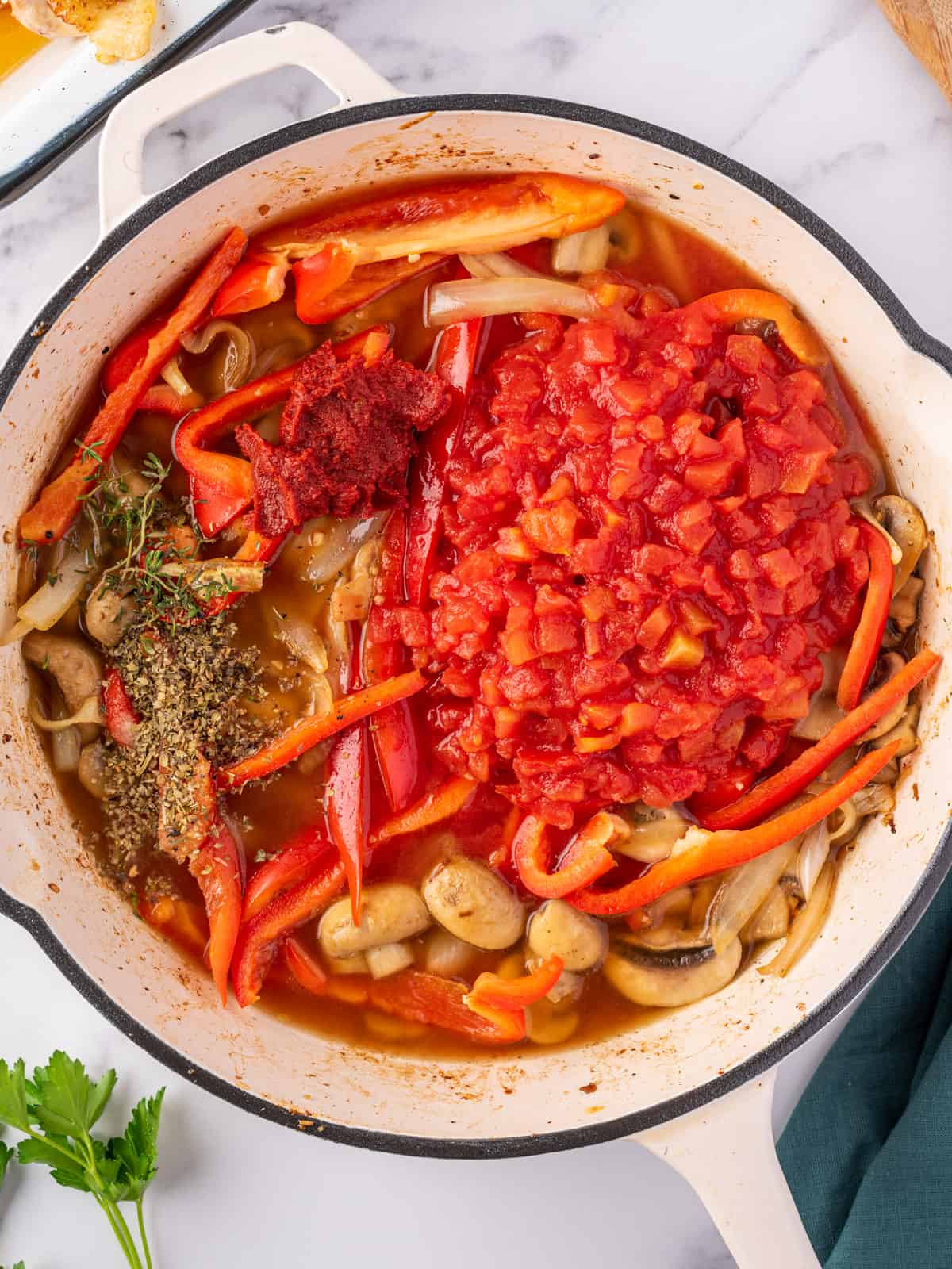 Process of making the sauce for the best chicken cacciatore.