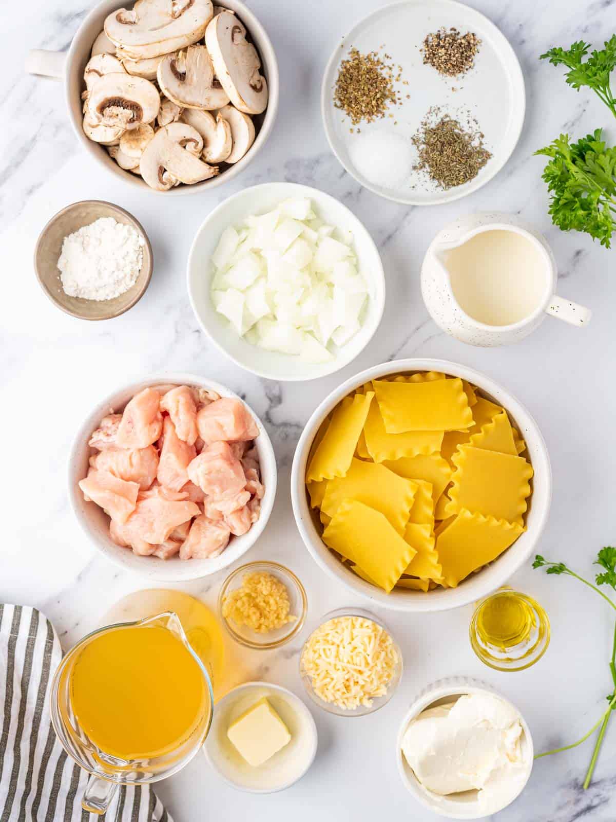 Ingredients needed for creamy white chicken lasagna soup.