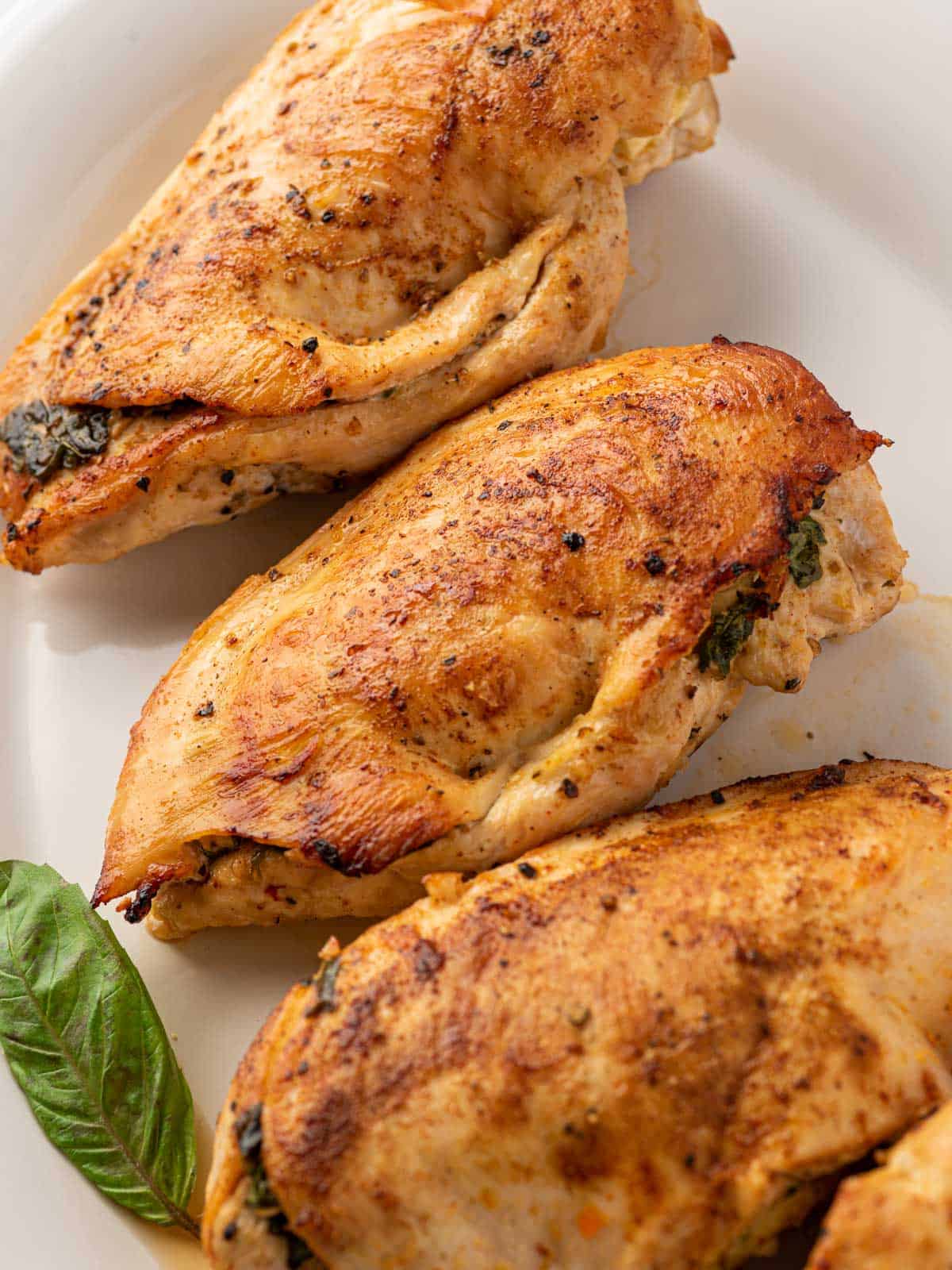 Close up of Mediterranean stuffed chicken breasts.