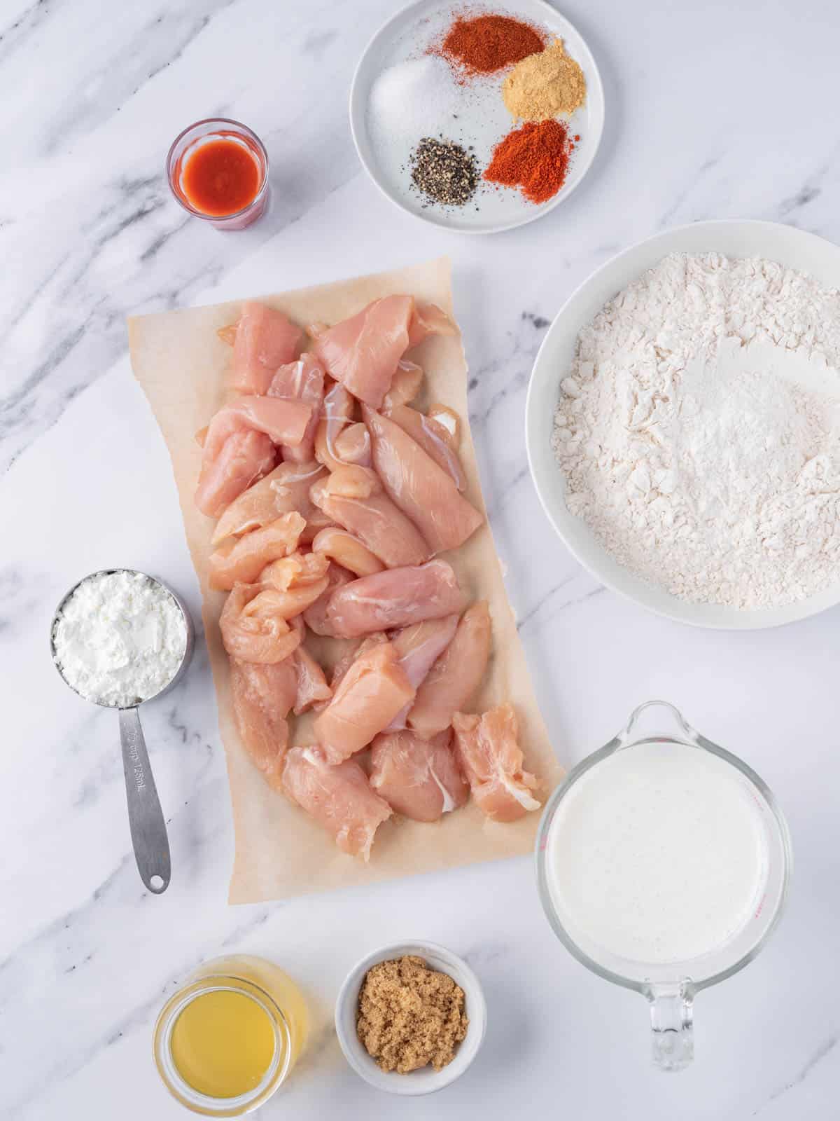 Ingredients needed to make Nashville hot chicken tenders.