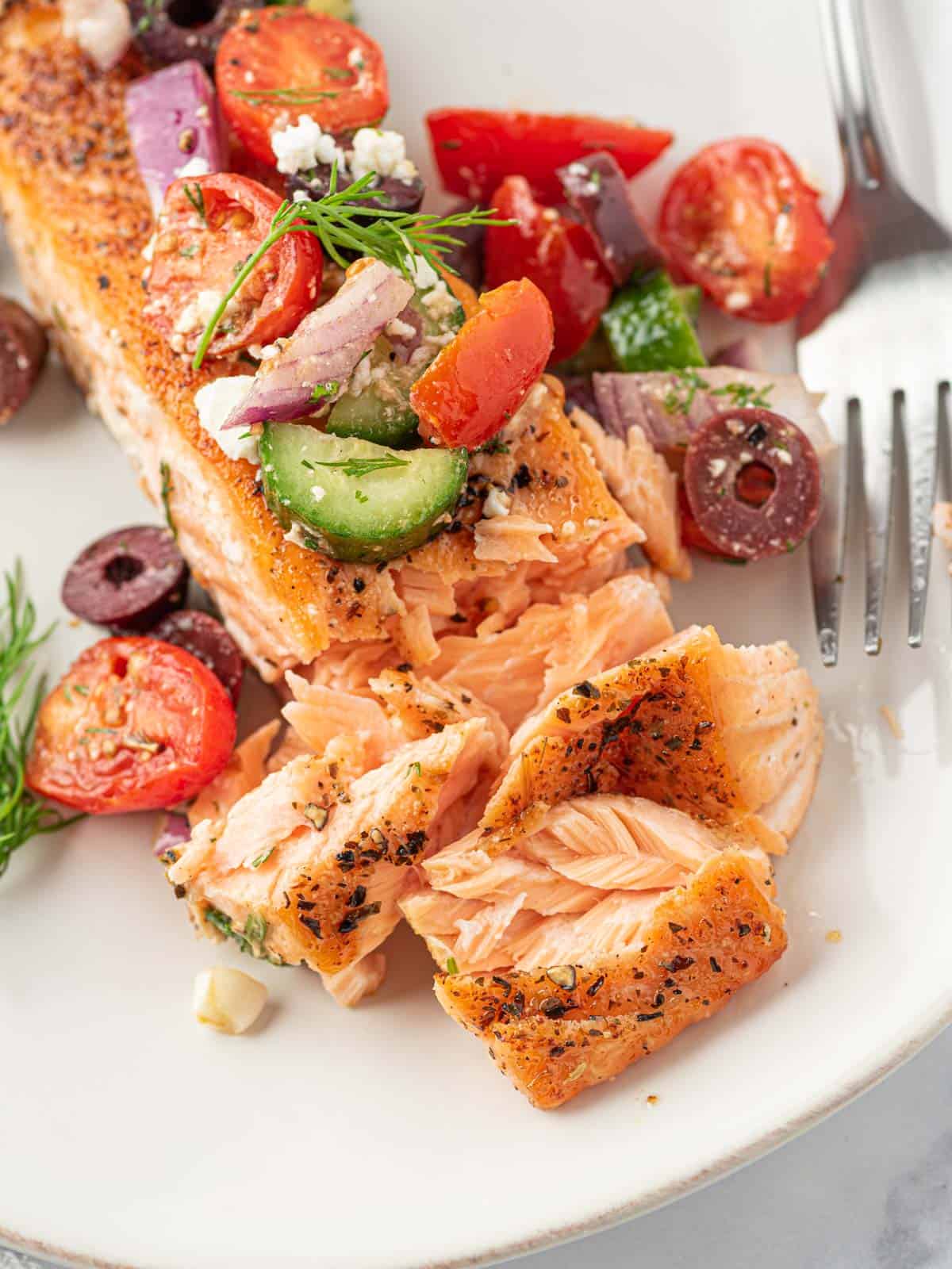 flaky salmon in a plate