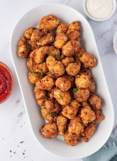 Homemade popcorn chicken on a platter for feeding a crowd.