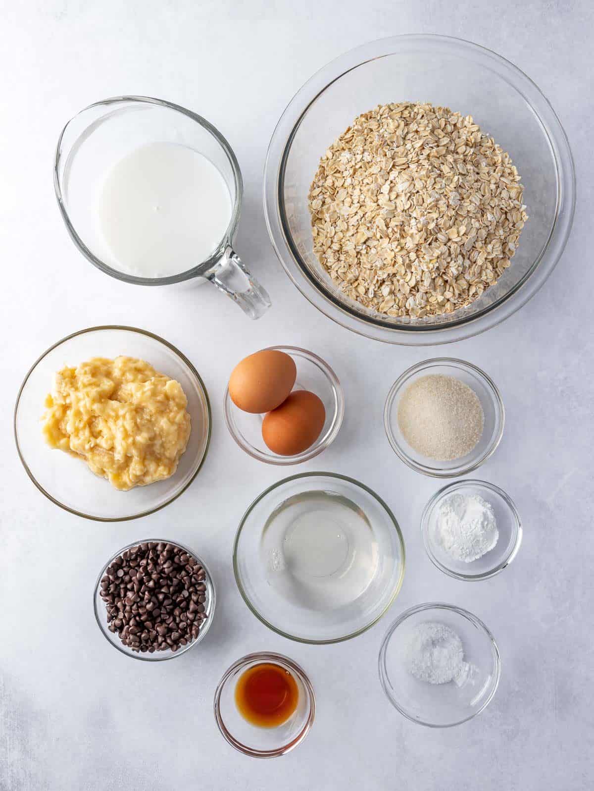 Ingredients needed to make baked banana oatmeal cups.