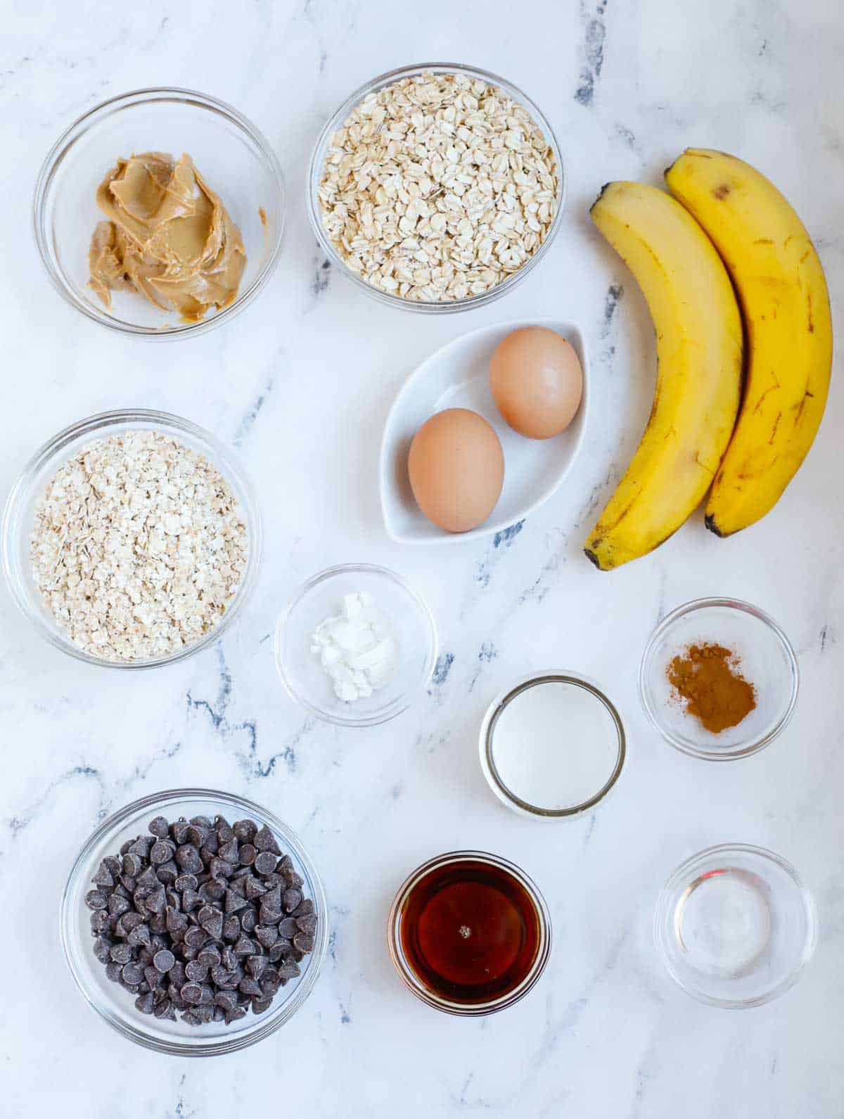 Ingredients needed for chocolate chip baked oatmeal. 
