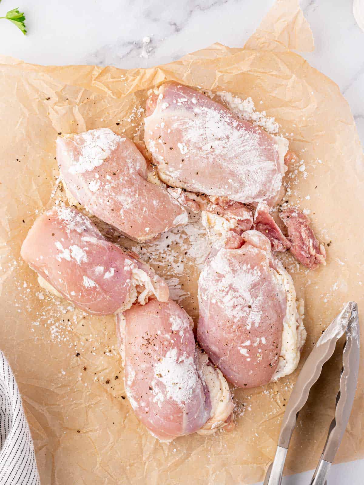 Chicken coated in cornstarch, salt, and pepper.