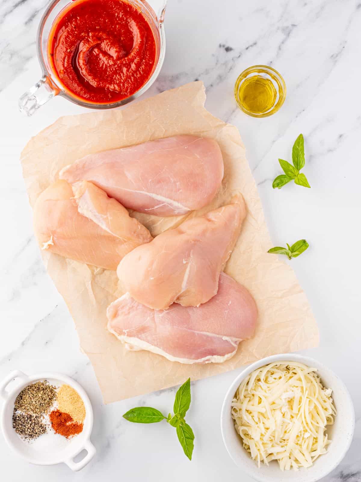 Ingredients needed to make low carb chicken parmesan.