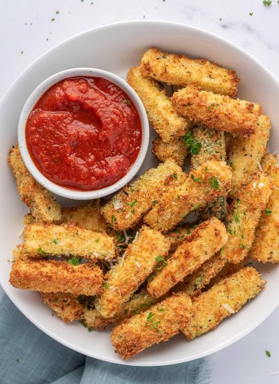 A platter of crispy zucchini sticks.