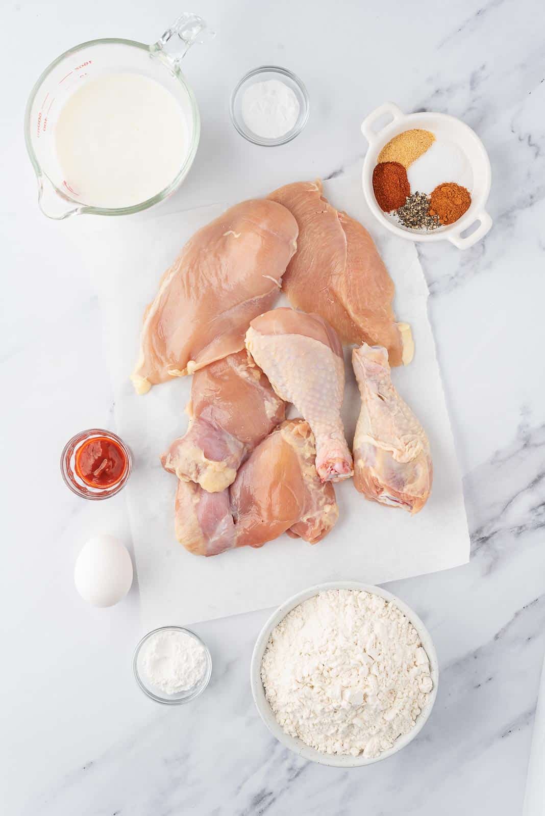 Ingredients needed for crunchy fried chicken.