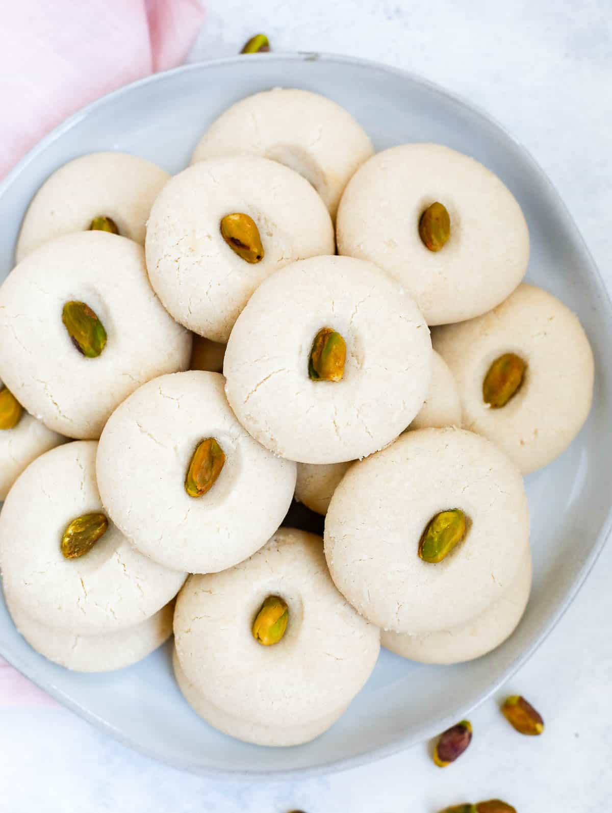 top down shot of the ghraybeh cookies in a white plate