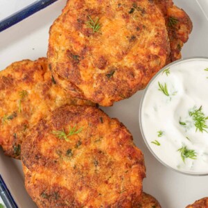 Closeup shot of air fryer salon patties on a serving tray.