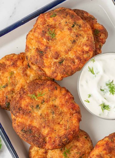 Closeup shot of air fryer salon patties on a serving tray.