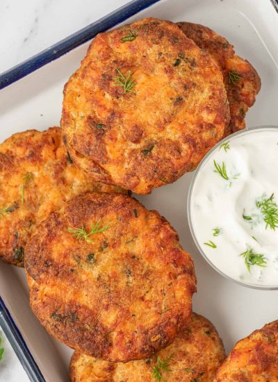 Closeup shot of air fryer salon patties on a serving tray.