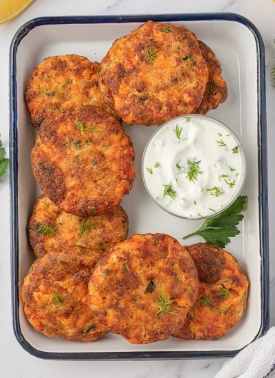 Fresh salmon patties recipe on a tray for serving.