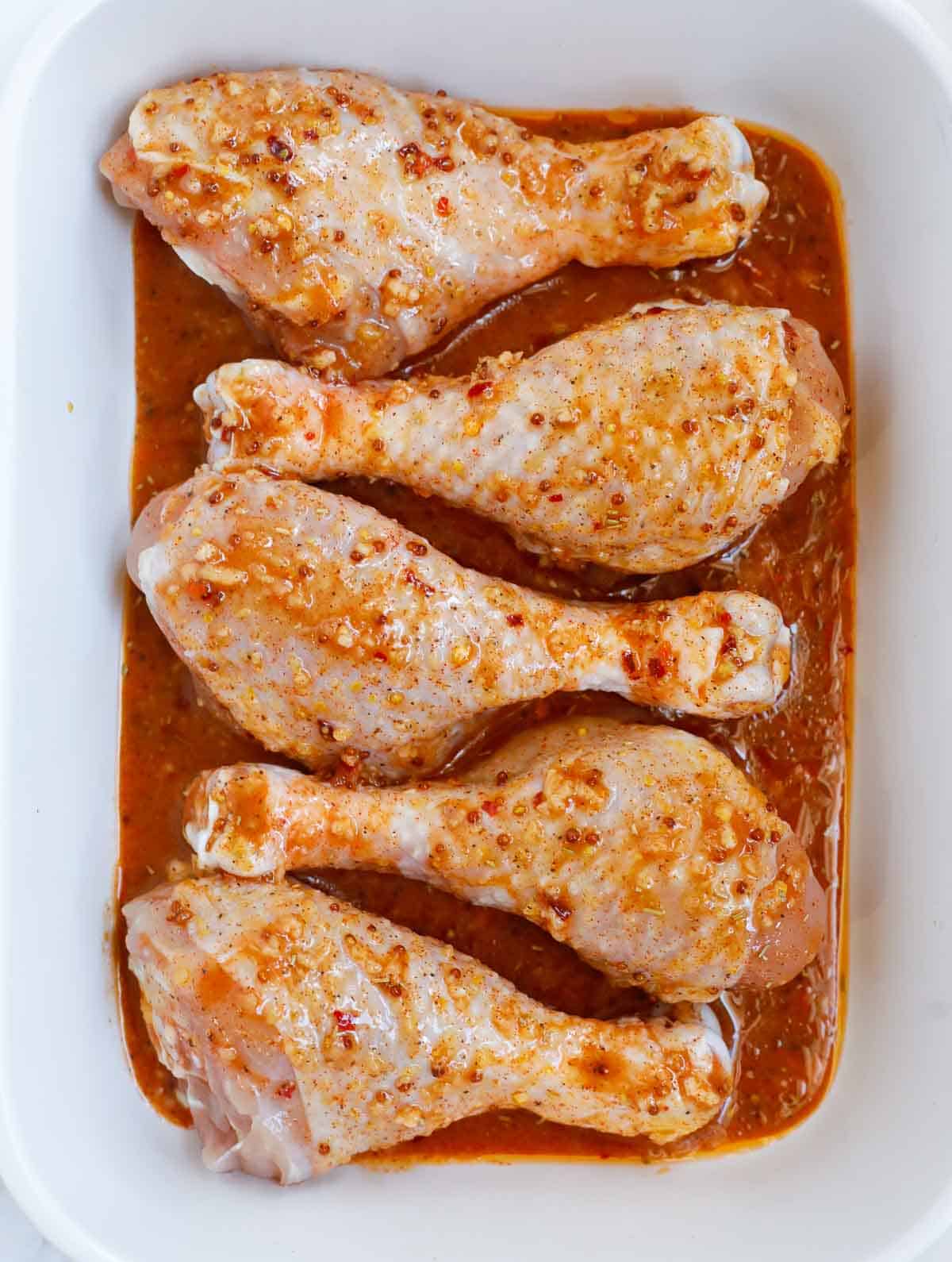 Chicken legs covered with honey mustard marinade.