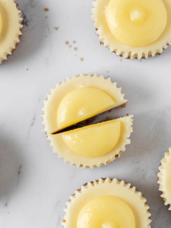 top down mini lemon cheesecake sliced in half