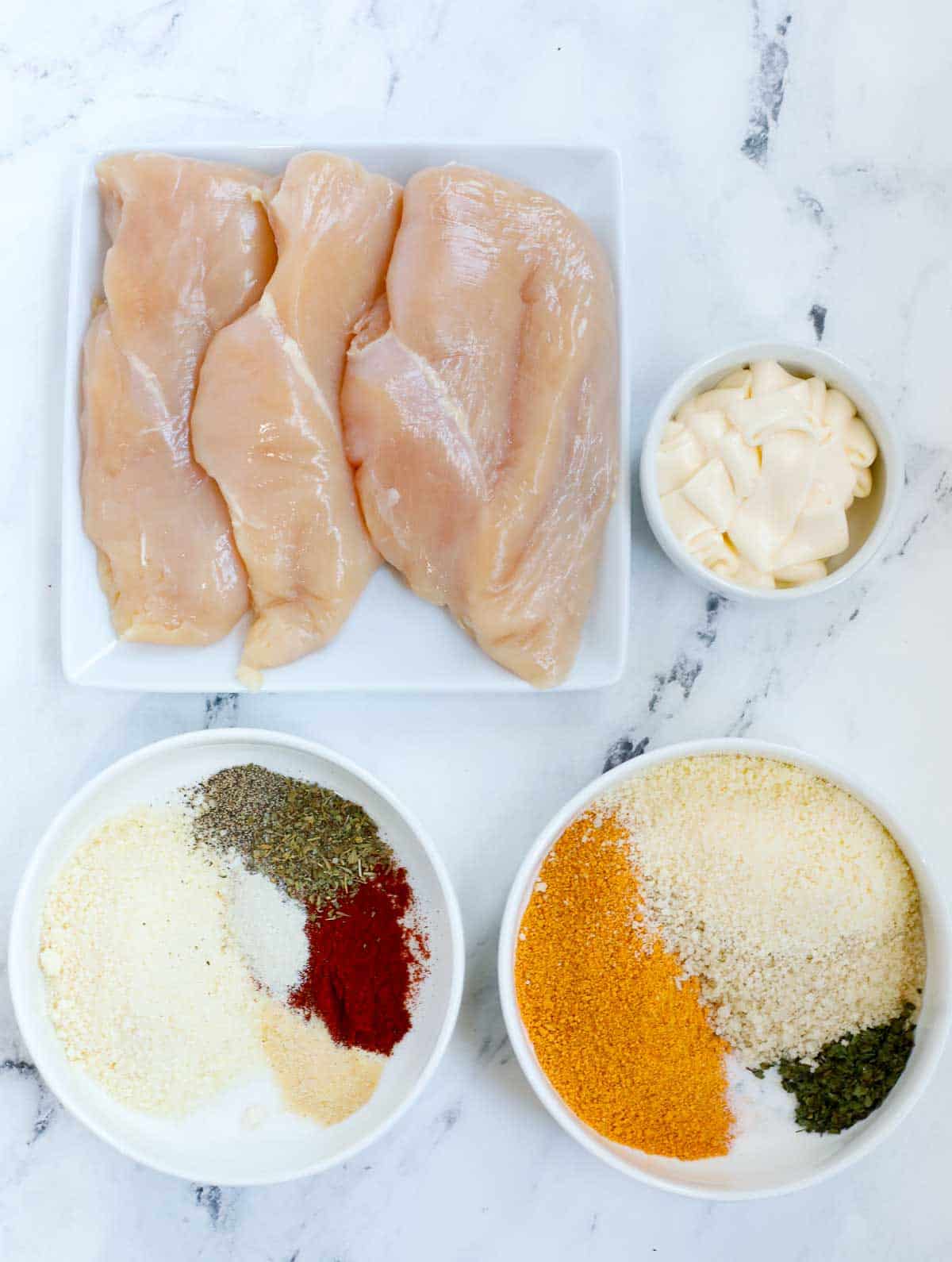 Ingredients needed for oven baked chicken cutlets.
