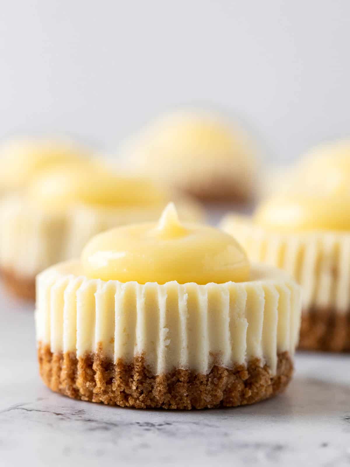 close up of mini lemon cheesecake