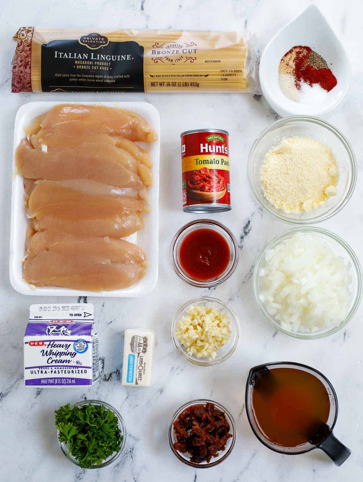 Ingredients needed for creamy spicy chicken pasta.