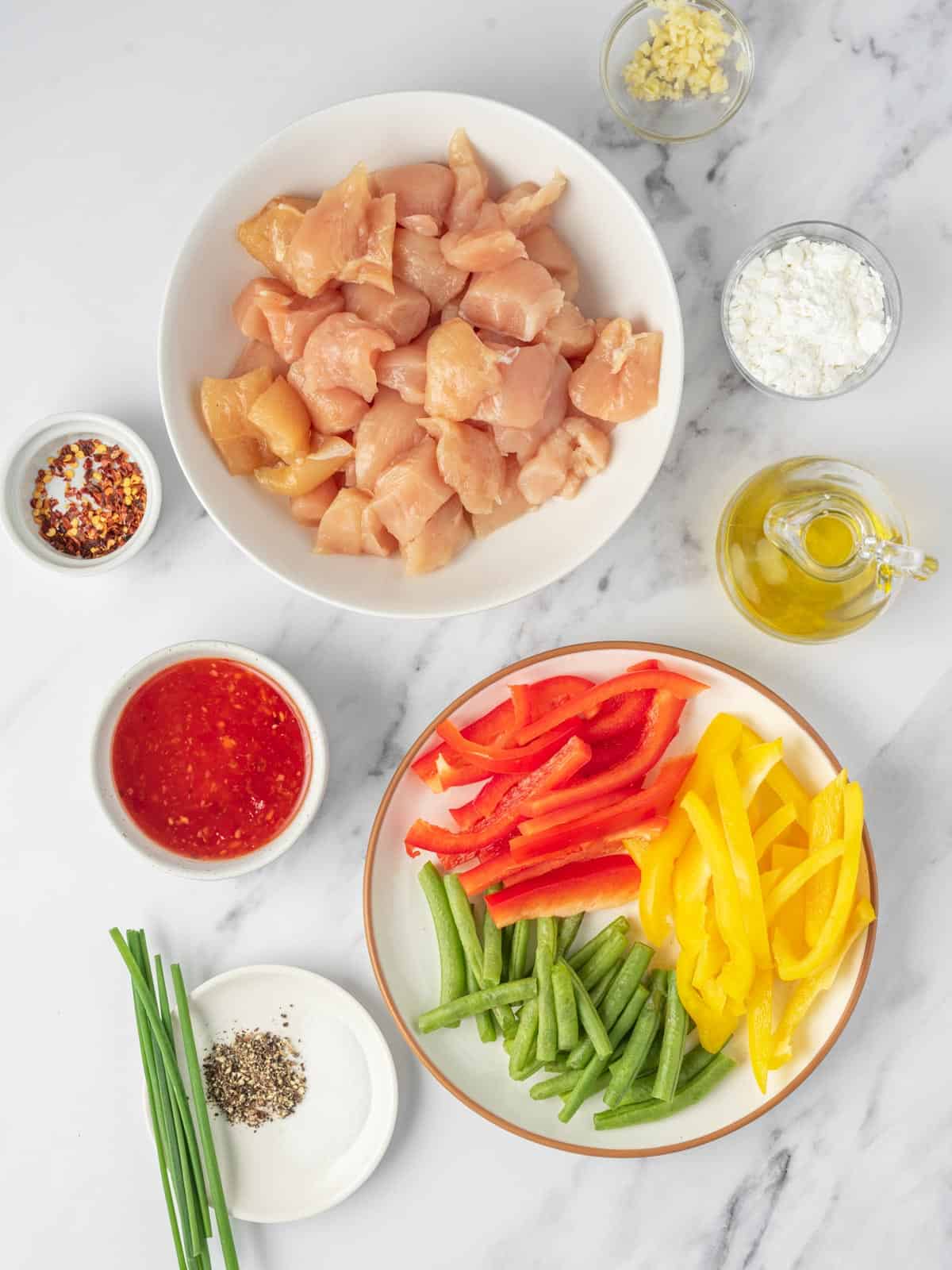 Ingredients needed for sweet Thai chili chicken stir fry.