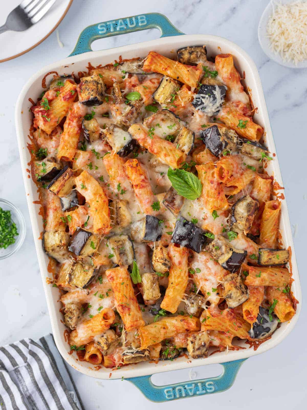 Garnished baked eggplant pasta ready to serve.