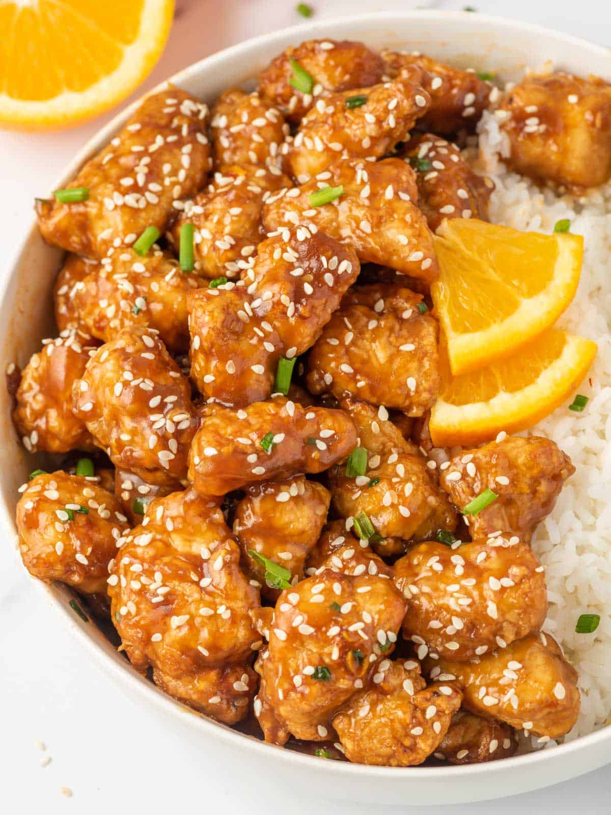 Crispy air fryer orange chicken with rice.