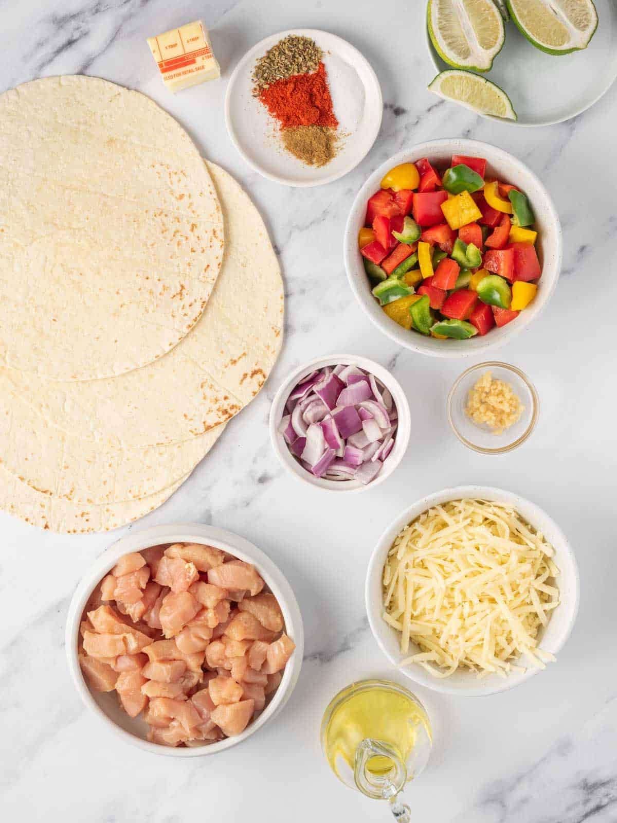 Ingredients needed for easy chicken quesadillas.