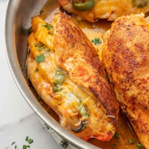 Mexican stuffed chicken in a pan.