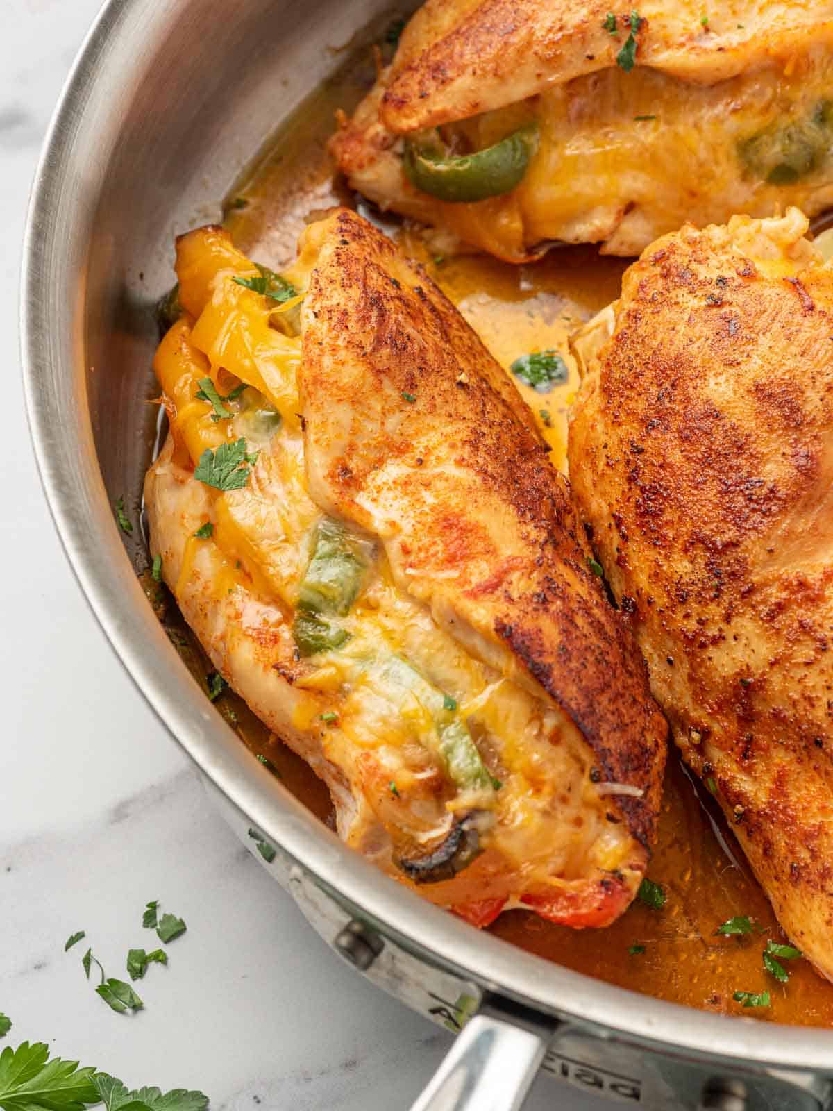 Mexican stuffed chicken in a pan.