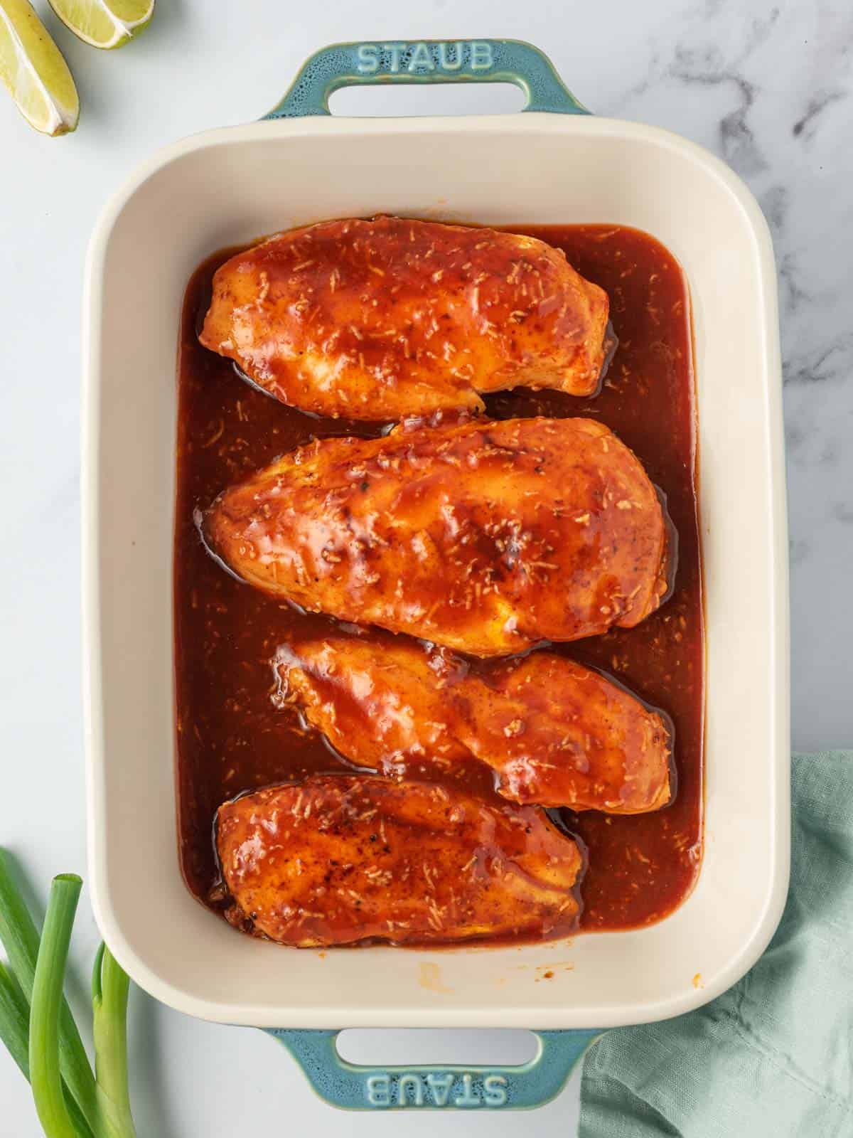 Spicy chicken breast recipe in a baking dish.
