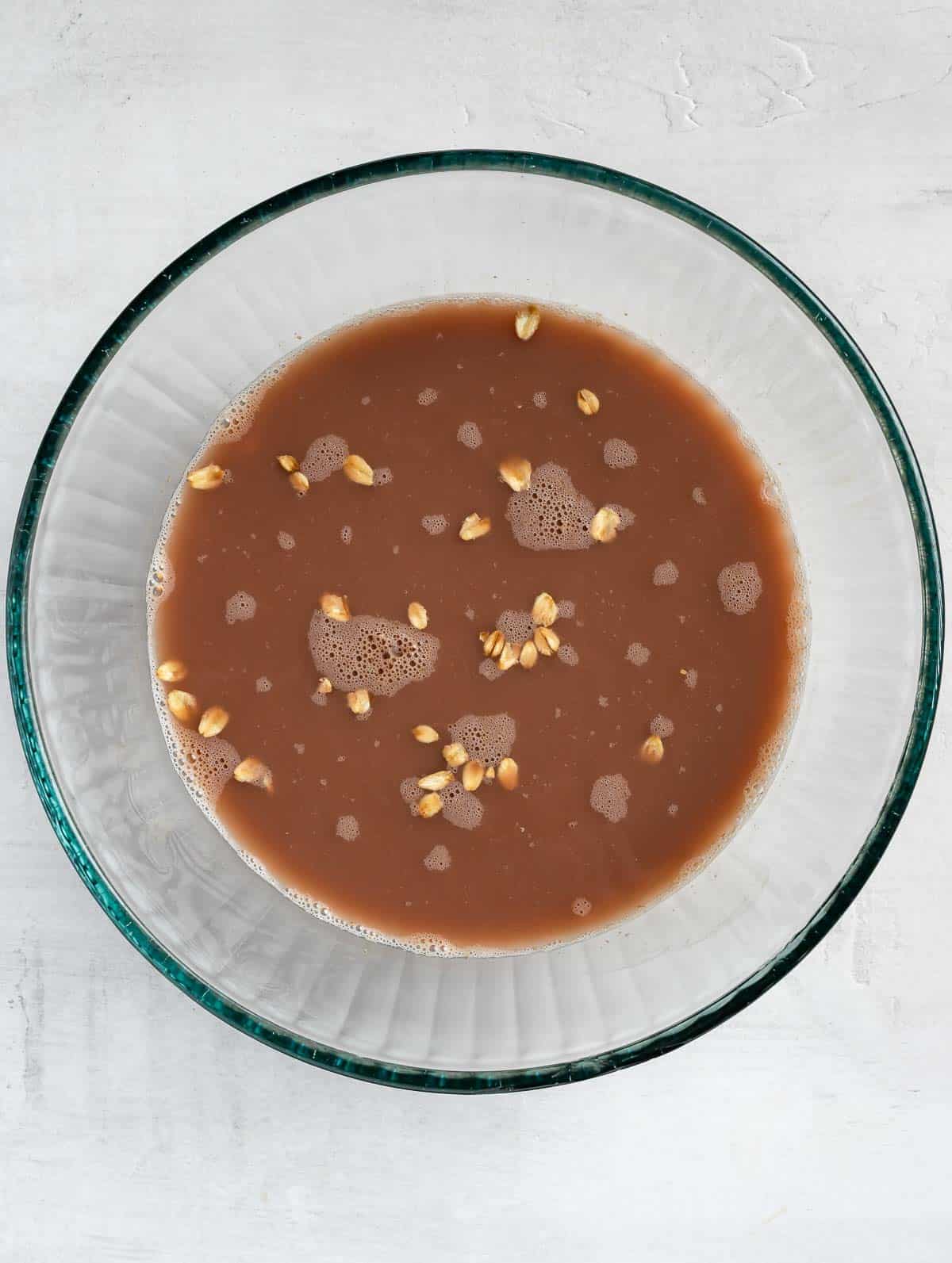 chocolate oats ingredients in a bowl before leaving overnight