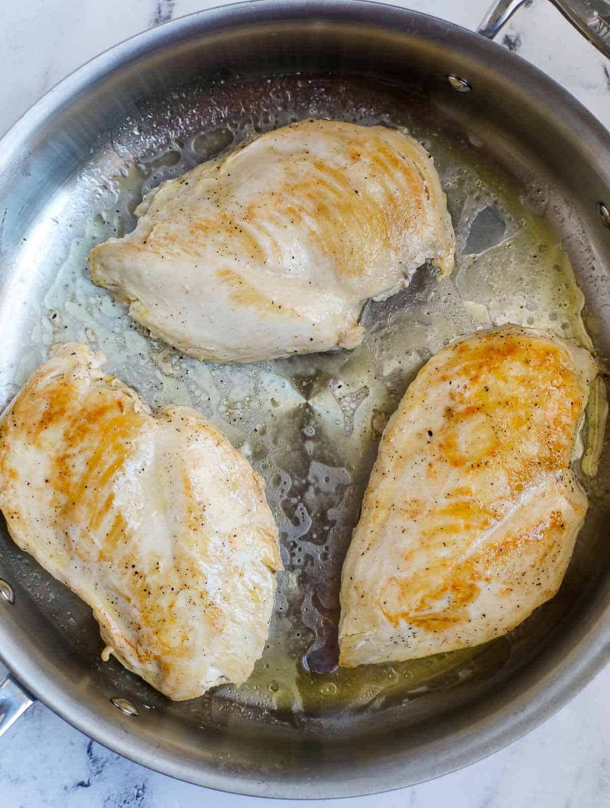 How to sear chicken breasts.