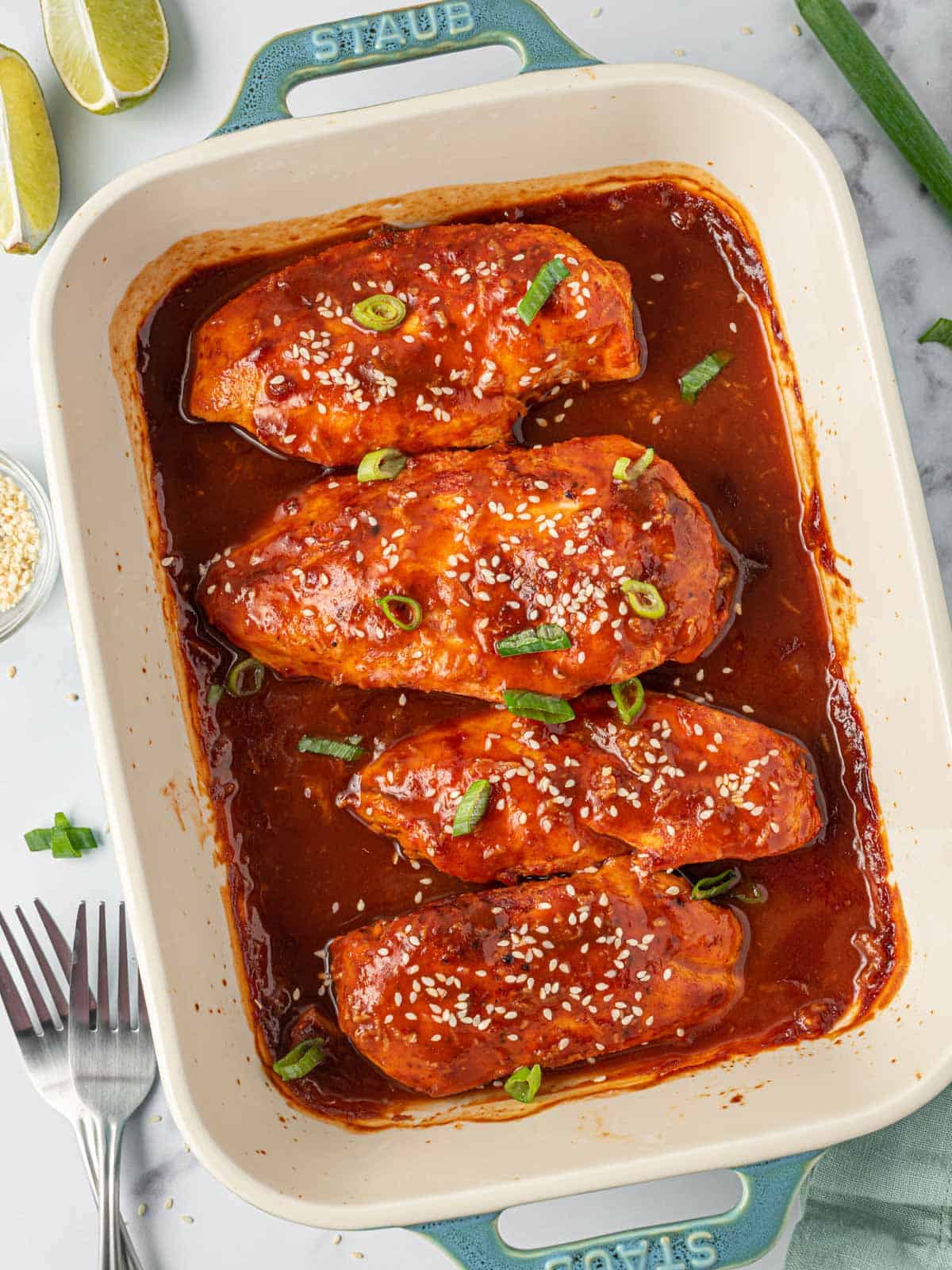 A tray of sweet and spicy honey sriracha chicken.